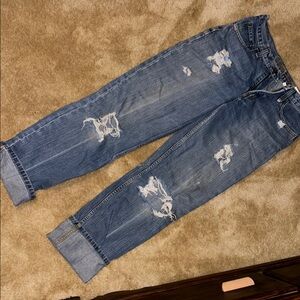 Women's Distressed Blue Jeans
